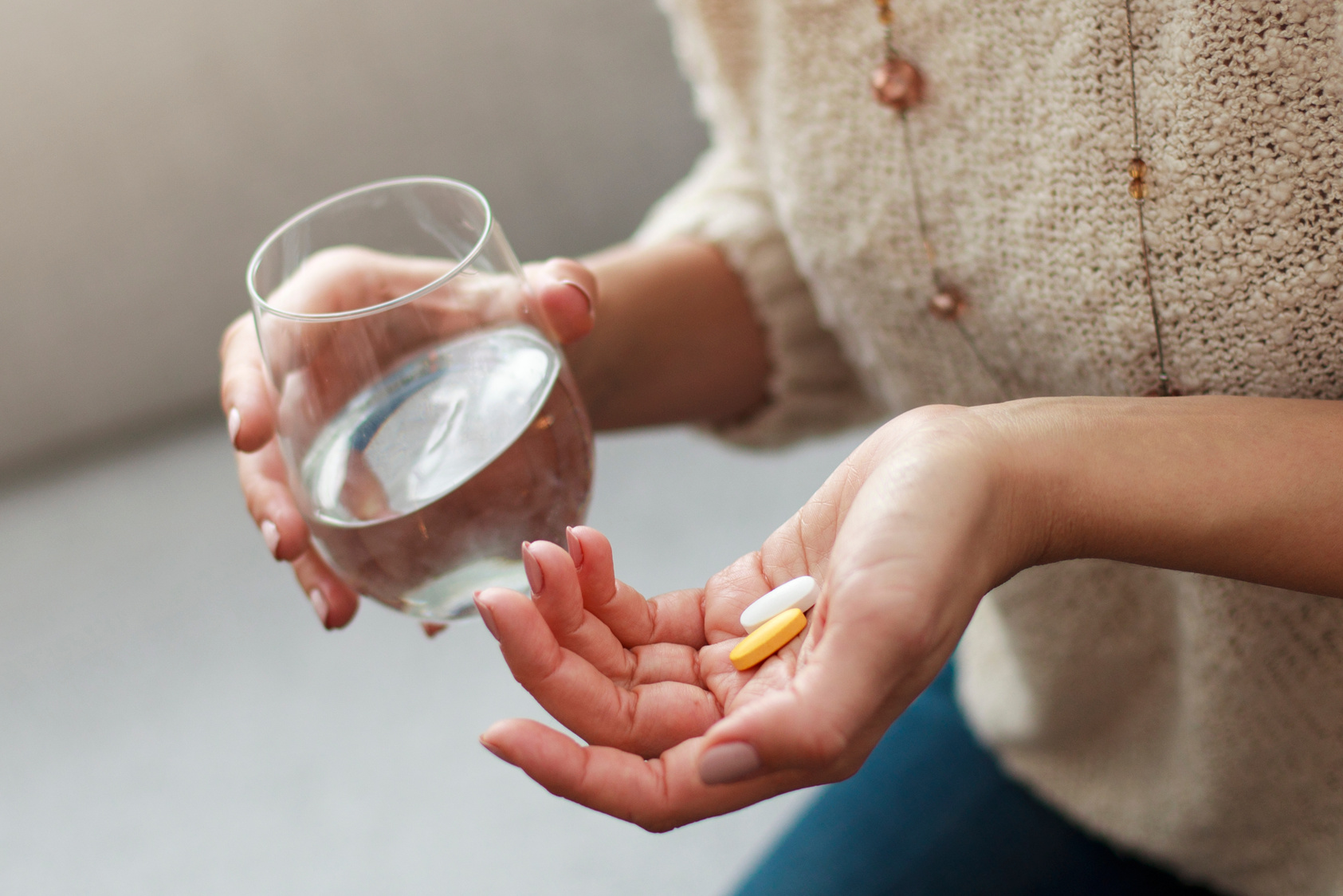 Woman Taking Vitamins